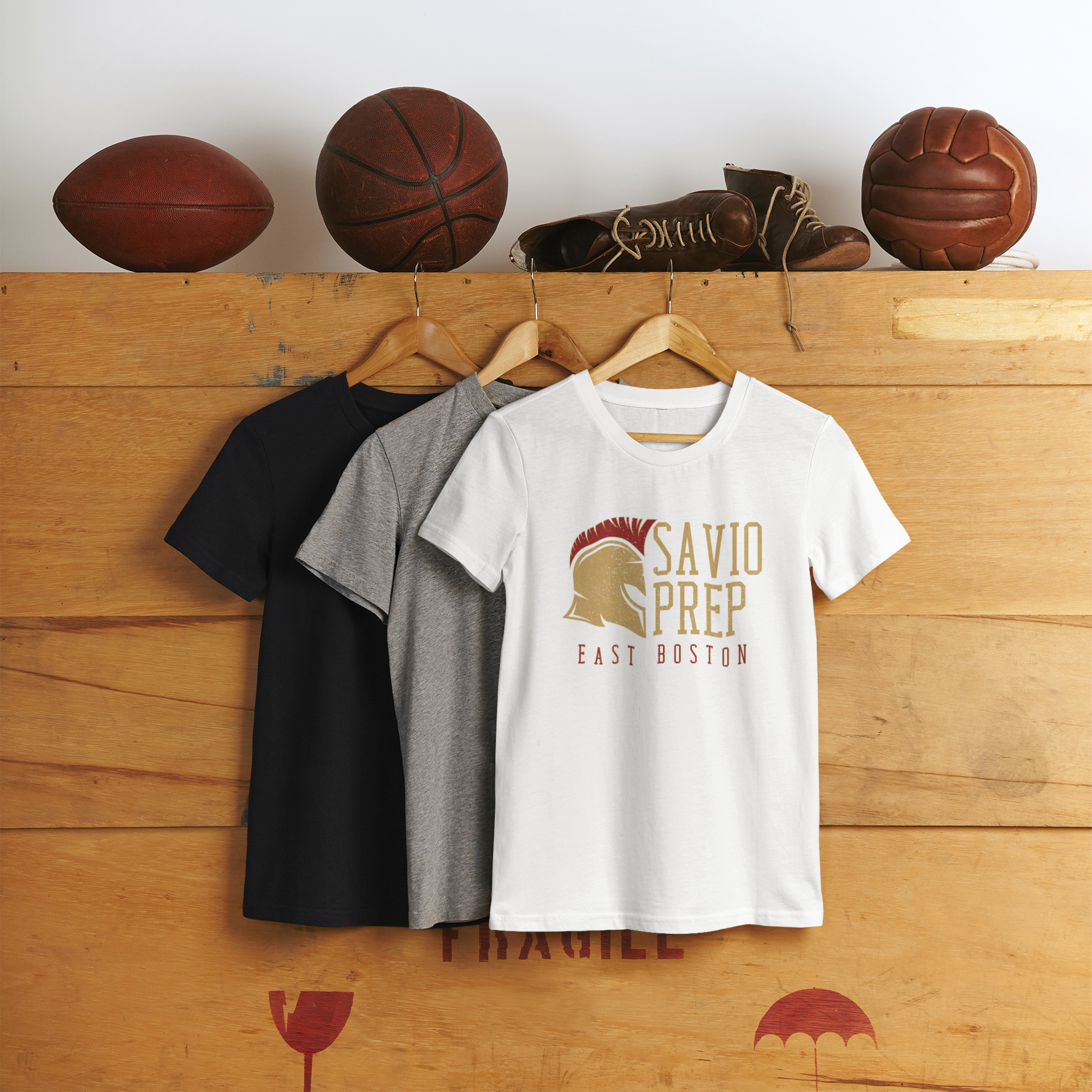 mockup-of-three-rounded-neck-t-shirts-hanging-on-a-wooden-box-m6276-r-el2